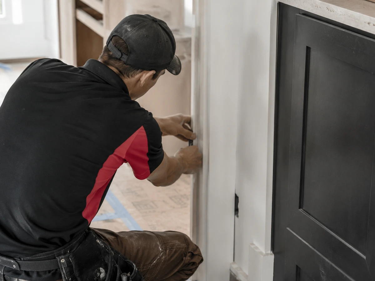 A Sharp crew member completing a careful residential repair